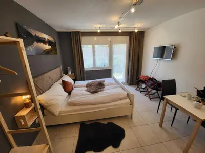 Ein Bett oder Betten in einem Zimmer der Unterkunft Ski-in cosy studio
