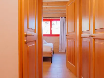 Ein Bett oder Betten in einem Zimmer der Unterkunft Chalet Les Silènes by Interhome