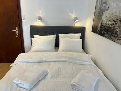 Ein Bett oder Betten in einem Zimmer der Unterkunft La Perle Montana