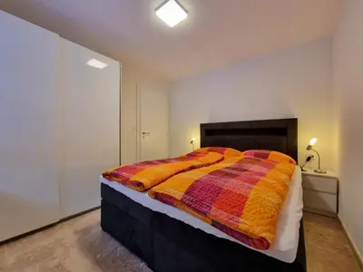 Ein Bett oder Betten in einem Zimmer der Unterkunft Zum Lerch Penthouse