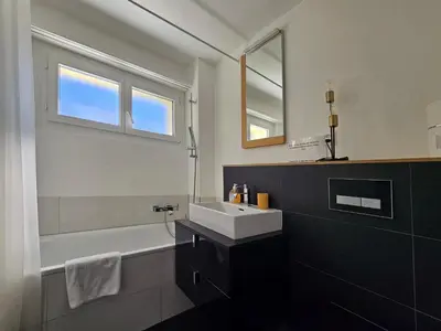Ein Badezimmer in der Unterkunft Falke 2nd Floor
