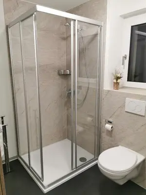 Ein Badezimmer in der Unterkunft Modernes Studio l Berge l Nähe Zermatt l Grächen