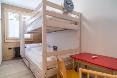 Ein Bett oder Betten in einem Zimmer der Unterkunft Apartment Ahornisegg - GRIWA RENT AG