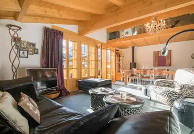 Ein Sitzbereich in der Unterkunft Waldbort Penthouse