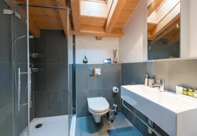 Ein Badezimmer in der Unterkunft Waldbort Penthouse