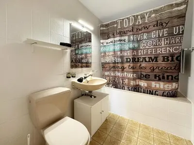 Ein Badezimmer in der Unterkunft Chez Tonton