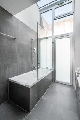 Ein Badezimmer in der Unterkunft Urban Cube mit Sauna