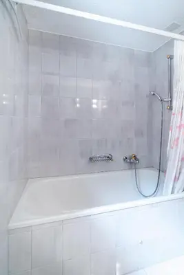 Ein Badezimmer in der Unterkunft Haus Bärgbach by Zermatt Premium Apartments