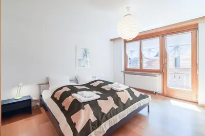 Ein Bett oder Betten in einem Zimmer der Unterkunft Haus Bärgbach by Zermatt Premium Apartments