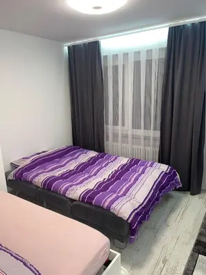 Ein Bett oder Betten in einem Zimmer der Unterkunft Holiday 88