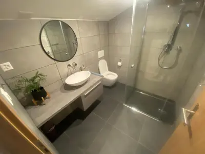 Ein Badezimmer in der Unterkunft Spring Inn Apartments