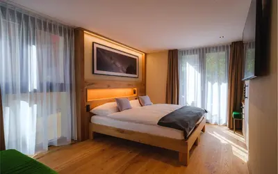 Ein Bett oder Betten in einem Zimmer der Unterkunft Hotel Tannenhof