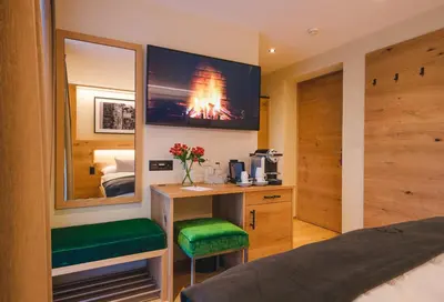 Ein Bett oder Betten in einem Zimmer der Unterkunft Hotel Tannenhof
