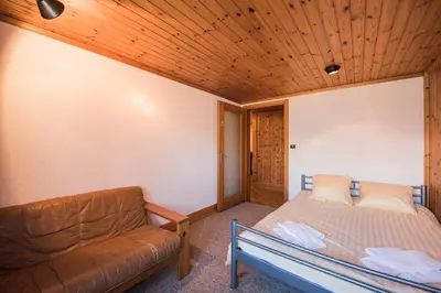 Ein Bett oder Betten in einem Zimmer der Unterkunft Chalet Bergwelt - Panoramic view