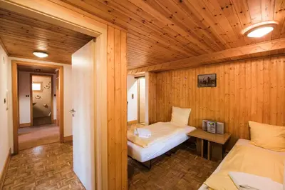 Ein Bett oder Betten in einem Zimmer der Unterkunft Chalet Bergwelt - Panoramic view