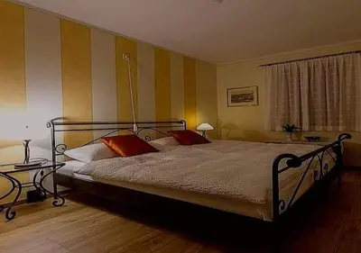 Ein Bett oder Betten in einem Zimmer der Unterkunft Antica Osteria Ghiridone