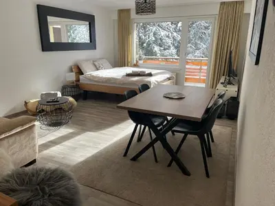 Ein Bett oder Betten in einem Zimmer der Unterkunft Grand Studio au centre de Crans