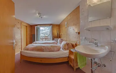 Ein Bett oder Betten in einem Zimmer der Unterkunft Anemone