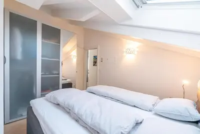 Ein Bett oder Betten in einem Zimmer der Unterkunft Haus La Rocca by Zermatt Premium Apartments