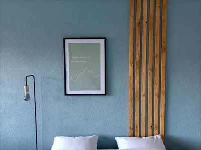Ein Bett oder Betten in einem Zimmer der Unterkunft Studio lumineux bien placé en ville de Sion