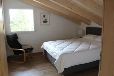 Ein Bett oder Betten in einem Zimmer der Unterkunft Mountain Oasis Apartment Kandersteg-Adelboden