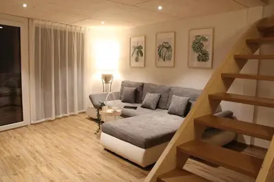 Ein Sitzbereich in der Unterkunft Mountain Oasis Apartment Kandersteg-Adelboden
