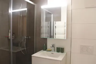 Ein Badezimmer in der Unterkunft Mountain Oasis Apartment Kandersteg-Adelboden