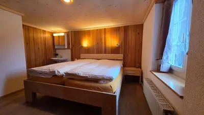 Ein Bett oder Betten in einem Zimmer der Unterkunft Adlerhorst - Apartment im Niedersimmental