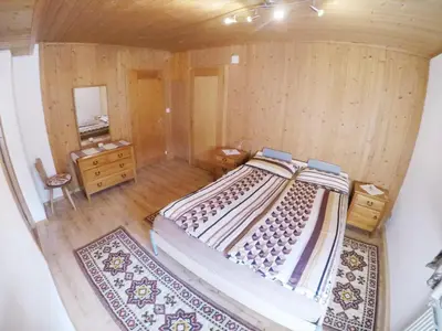 Ein Bett oder Betten in einem Zimmer der Unterkunft Gemütliche Ferienwohnung im Berner Oberland