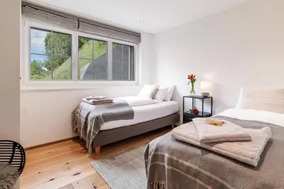 Ein Bett oder Betten in einem Zimmer der Unterkunft Chalet Alpenheim 1