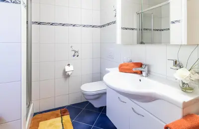 Ein Badezimmer in der Unterkunft Chalet Hannegg 2