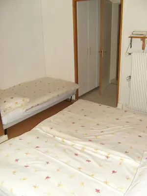 Ein Bett oder Betten in einem Zimmer der Unterkunft Vista Resort Hostel