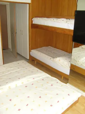 Ein Bett oder Betten in einem Zimmer der Unterkunft Vista Resort Hostel