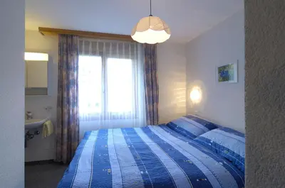 Ein Bett oder Betten in einem Zimmer der Unterkunft Haus Alpenglück