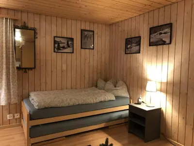 Ein Bett oder Betten in einem Zimmer der Unterkunft Apartment Lohnerblick by Interhome