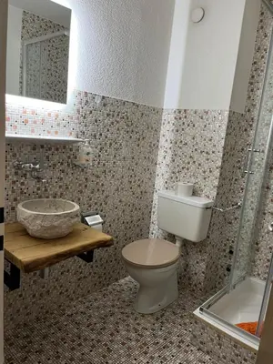 Ein Badezimmer in der Unterkunft Haus Atlantic Leukerbad