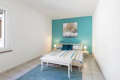 Ein Bett oder Betten in einem Zimmer der Unterkunft Cà da Sott