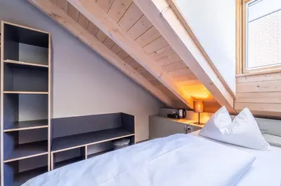 Ein Bett oder Betten in einem Zimmer der Unterkunft The Guesthouse by The Hey Hotel