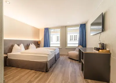 Ein Bett oder Betten in einem Zimmer der Unterkunft The Guesthouse by The Hey Hotel
