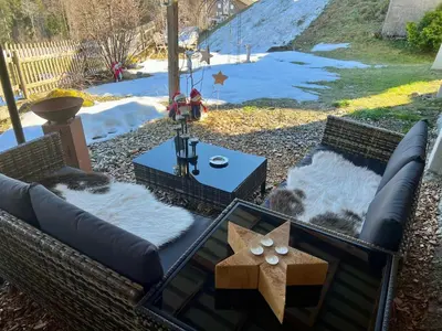 Ein Sitzbereich in der Unterkunft Engel Ingold Lodge Chalet 