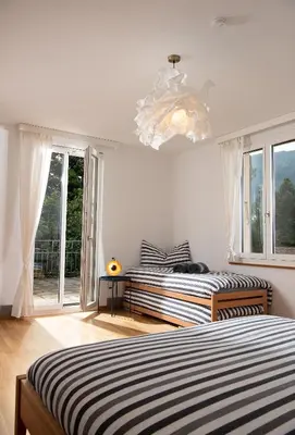 Ein Bett oder Betten in einem Zimmer der Unterkunft Boutique Villa J87