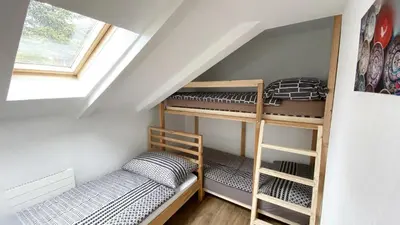 Ein Bett oder Betten in einem Zimmer der Unterkunft Holiday Apartments Falke