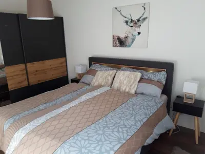 Ein Bett oder Betten in einem Zimmer der Unterkunft Résidence Plambramois