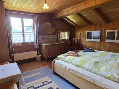 Ein Bett oder Betten in einem Zimmer der Unterkunft Apartment Hübeli - Kopp by Interhome