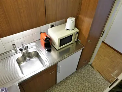 Küche/Küchenzeile in der Unterkunft Apartment Résidence du Golf A 07 by Interhome