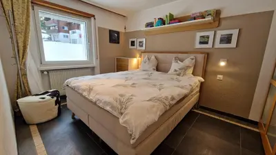 Ein Bett oder Betten in einem Zimmer der Unterkunft Haus VALLESIA