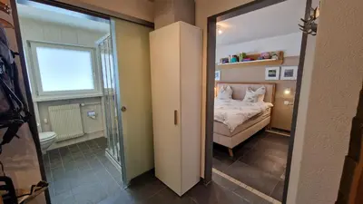 Ein Bett oder Betten in einem Zimmer der Unterkunft Haus VALLESIA