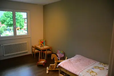 Ein Bett oder Betten in einem Zimmer der Unterkunft Mayers Swiss House, private home for 2-6 guests