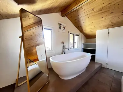 Ein Badezimmer in der Unterkunft beim Brunnen