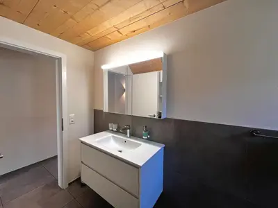 Ein Badezimmer in der Unterkunft beim Brunnen